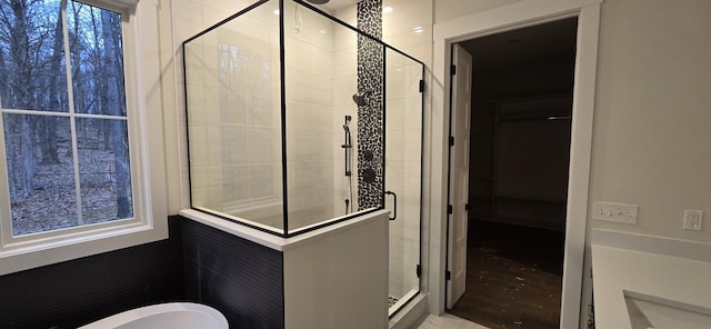 bathroom featuring walk in shower