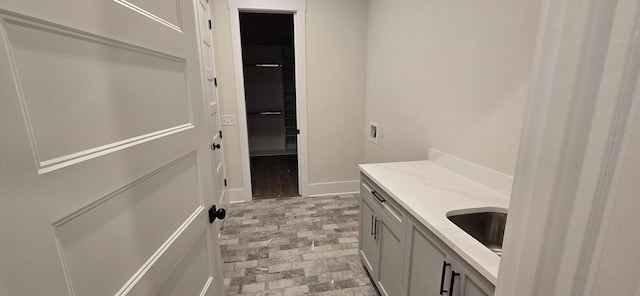 laundry area with sink