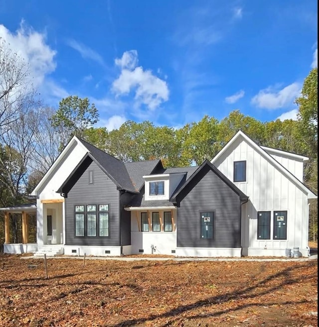 rear view of property featuring a porch