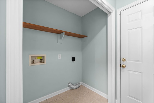 washroom featuring washer hookup, baseboards, electric dryer hookup, and light tile patterned flooring