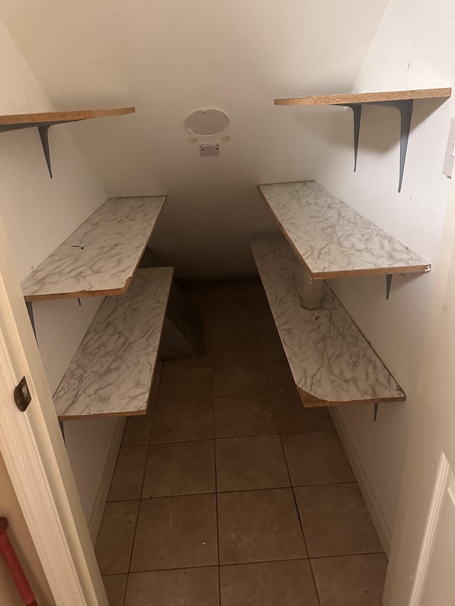 bathroom with tile patterned flooring