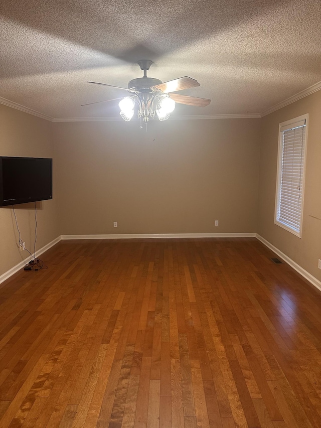 unfurnished room featuring crown molding, ceiling fan, hardwood / wood-style floors, and a textured ceiling