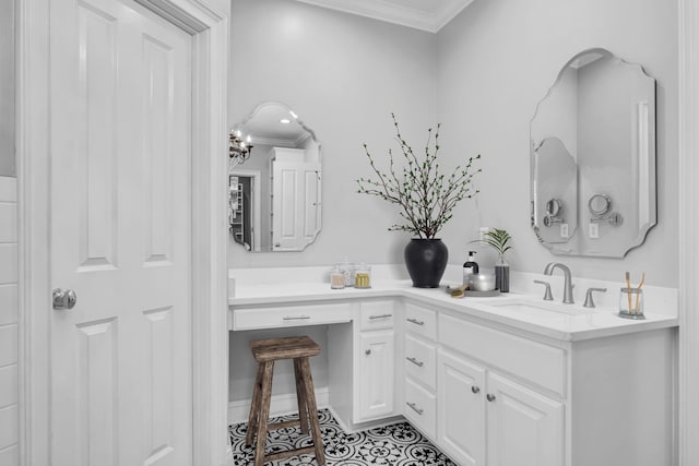 bathroom with ornamental molding, tile patterned flooring, and vanity