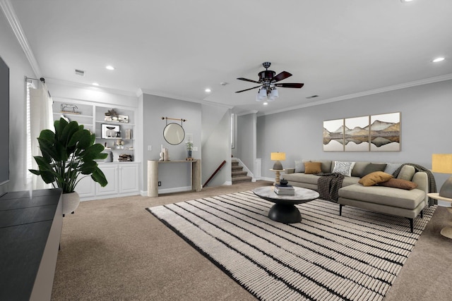 living room with crown molding, carpet flooring, and ceiling fan