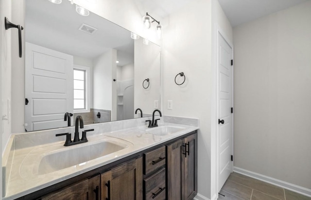 bathroom featuring vanity and tile patterned floors