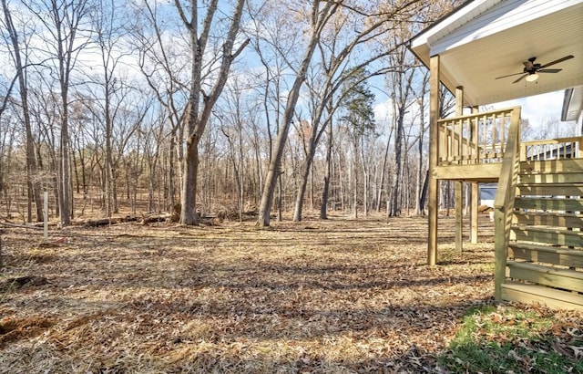 view of yard featuring ceiling fan