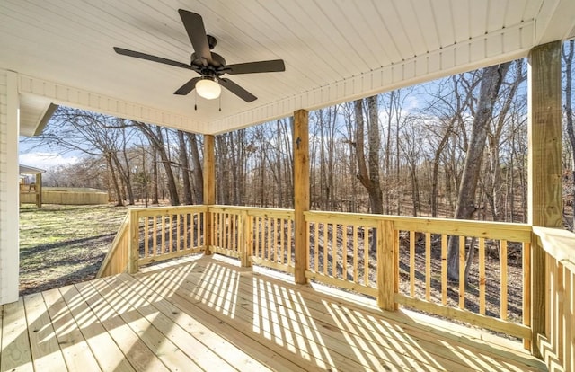 wooden terrace featuring ceiling fan