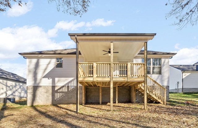 rear view of property featuring cooling unit, a deck, and ceiling fan