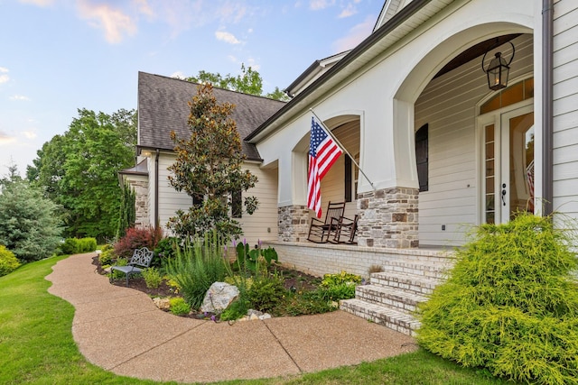 doorway to property with covered porch