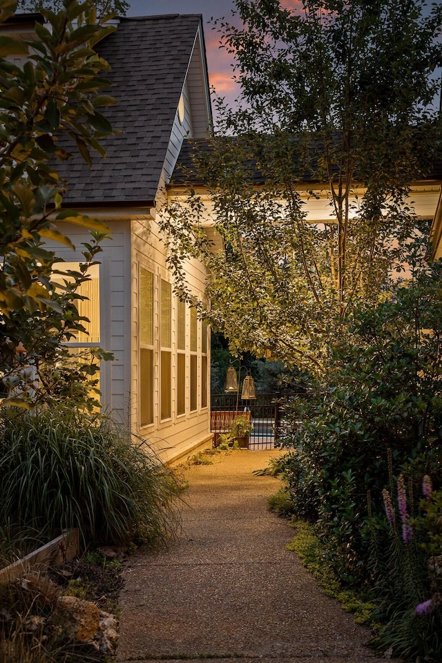 view of property exterior at dusk