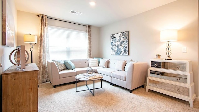 living room with light colored carpet