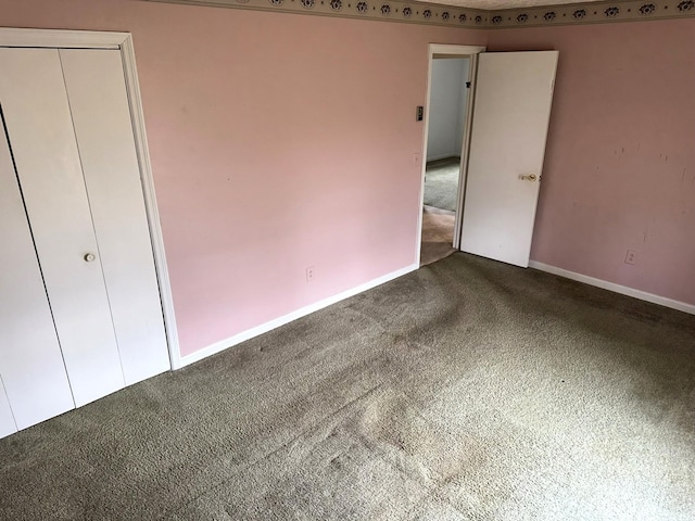 unfurnished bedroom featuring carpet