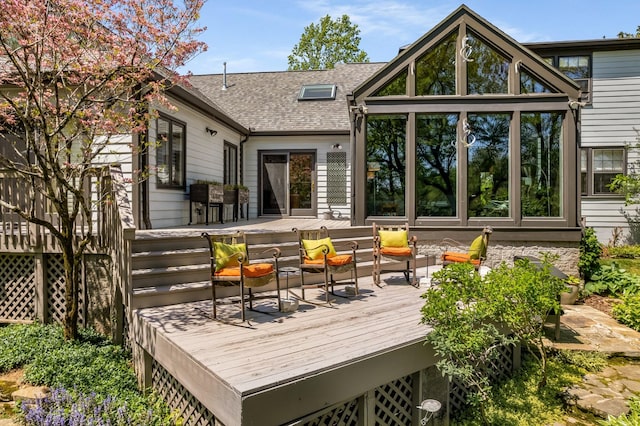 rear view of property with a deck