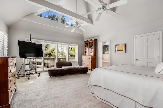 carpeted bedroom featuring high vaulted ceiling and ceiling fan