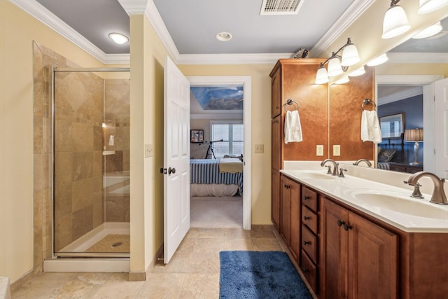 bathroom with ornamental molding, a shower with door, and vanity