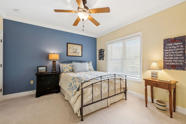 carpeted bedroom with crown molding and ceiling fan