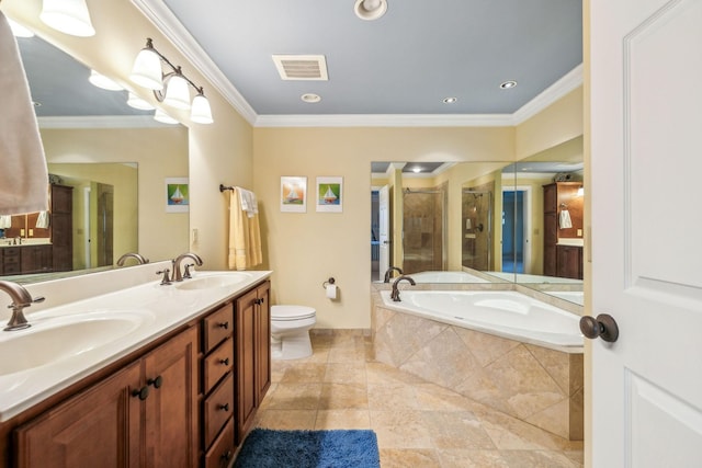 full bathroom featuring ornamental molding, separate shower and tub, vanity, and toilet