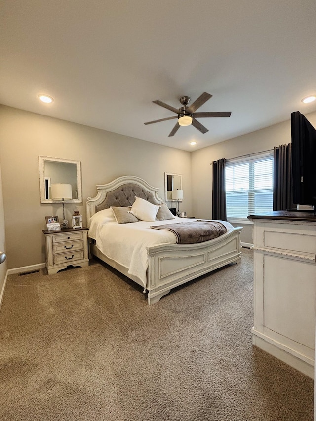 bedroom featuring ceiling fan and carpet flooring