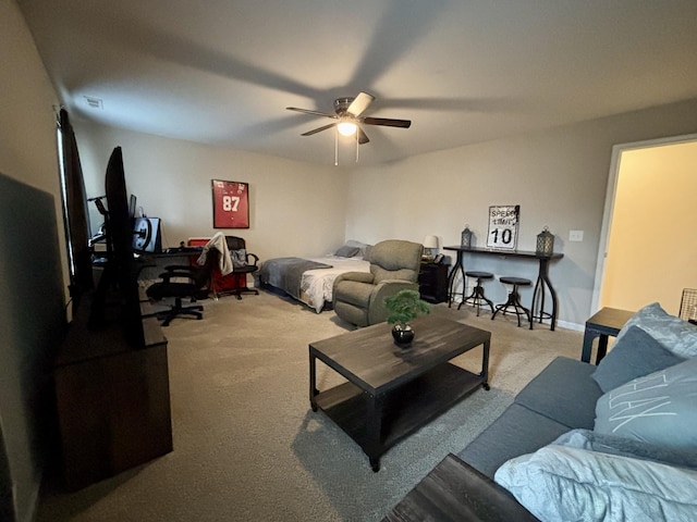 living room with ceiling fan and light colored carpet