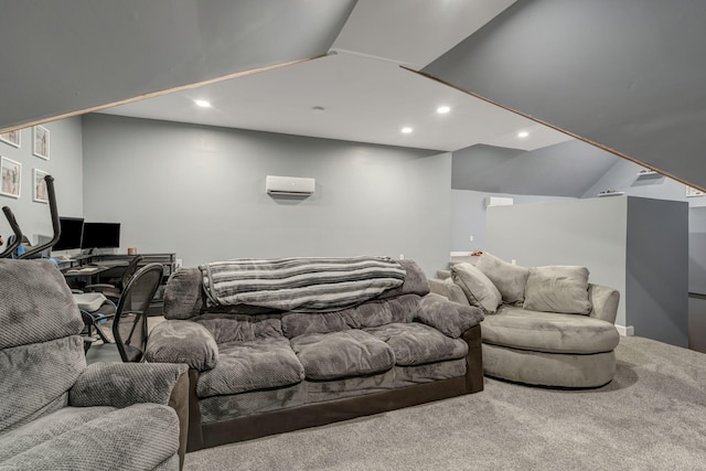 carpeted cinema with lofted ceiling and a wall mounted AC