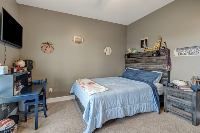 bedroom with light carpet