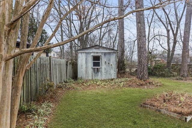 view of outdoor structure with a lawn