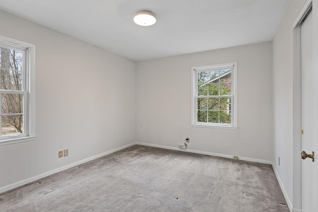 spare room featuring carpet floors