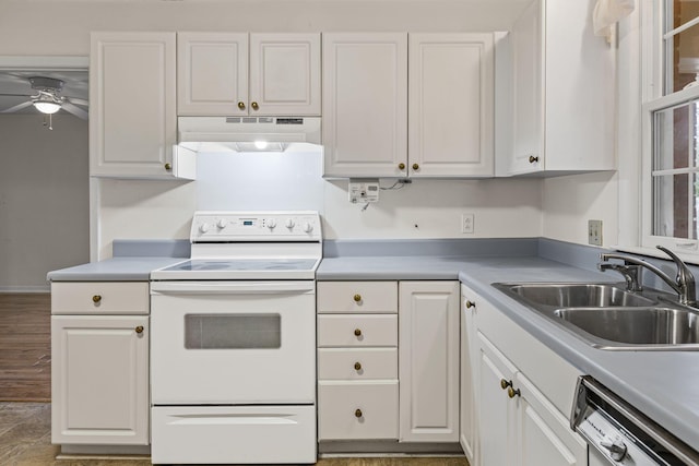 kitchen featuring white cabinets and white range with electric cooktop