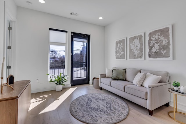 living room with light wood-type flooring