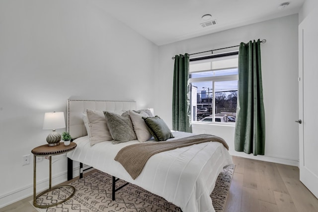 bedroom featuring light hardwood / wood-style flooring