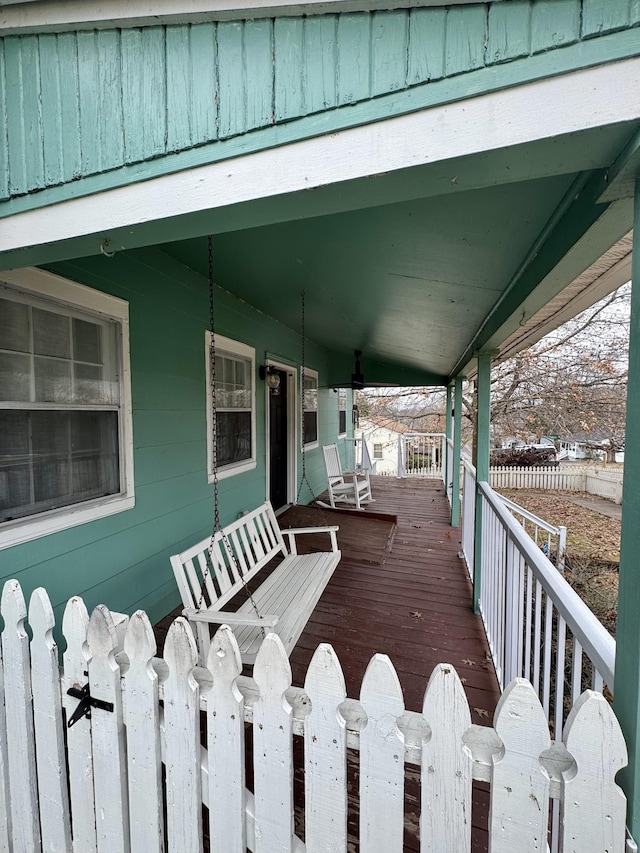 wooden terrace featuring a porch