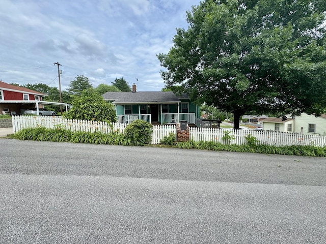 1609 Turner St, Old Hickory, TN 37138 - view of front of home with a porch, a chimney, and a fenced front yard