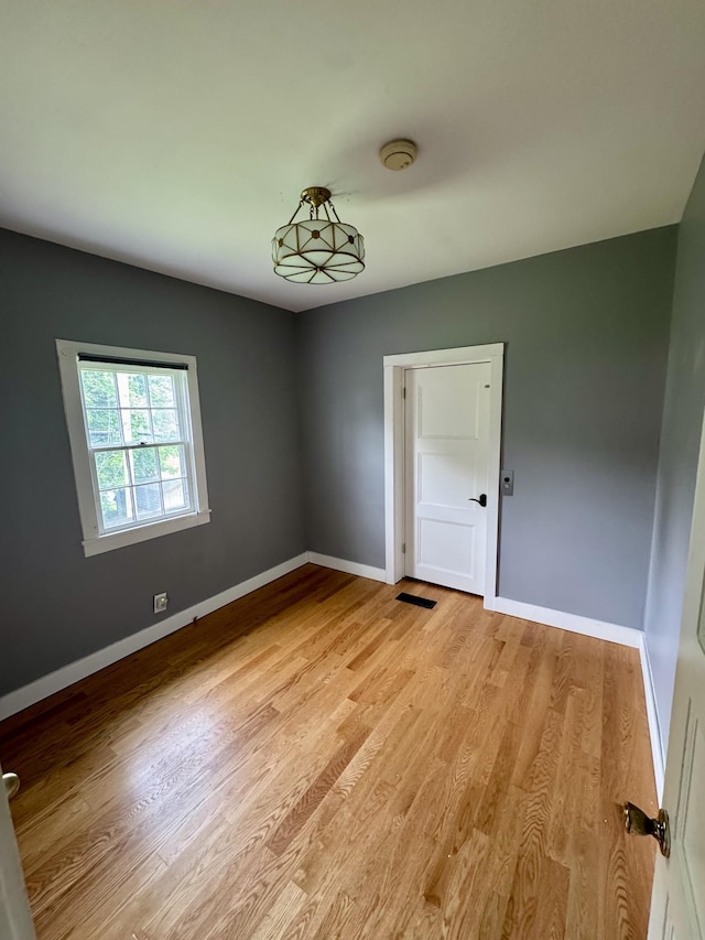 1609 Turner St, Old Hickory, TN 37138 - empty room with baseboards, light wood-style flooring, and a smoke detector