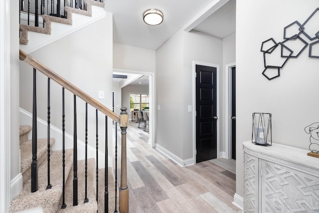 entrance foyer with light hardwood / wood-style floors