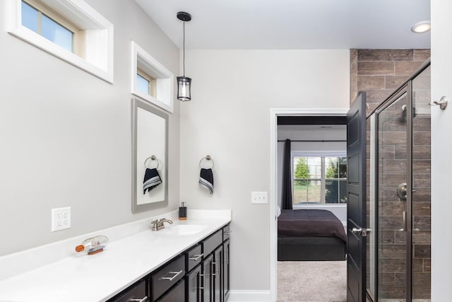 bathroom with vanity and an enclosed shower