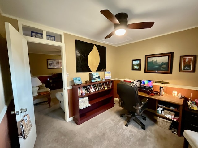 office with light carpet and ceiling fan