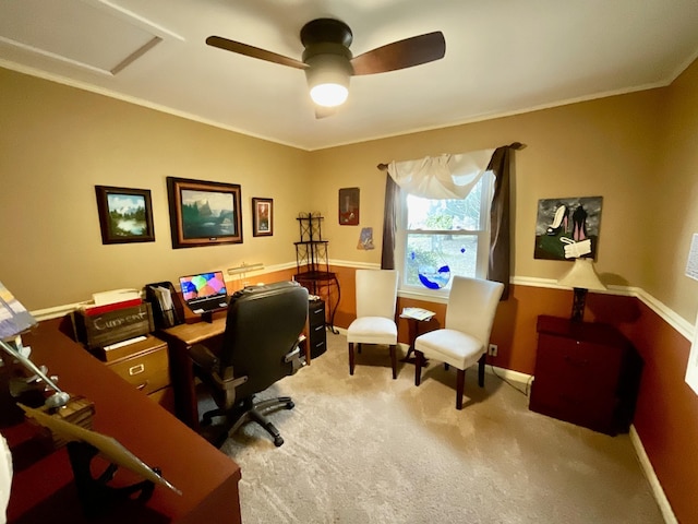 carpeted home office featuring ceiling fan