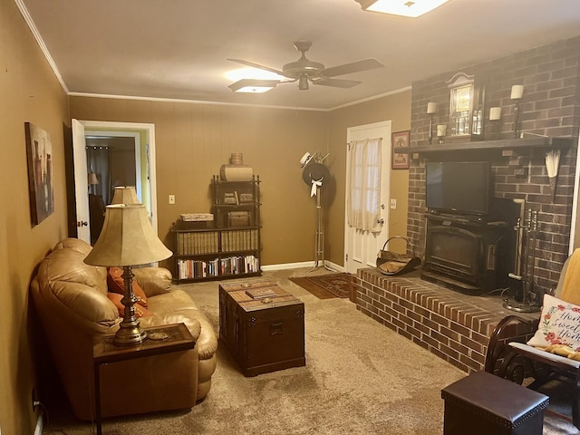 carpeted living room featuring crown molding and ceiling fan