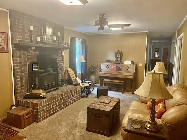 sitting room featuring crown molding, ceiling fan, and carpet floors