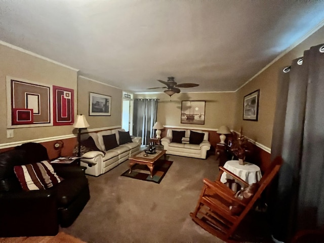 carpeted living room with ceiling fan and ornamental molding