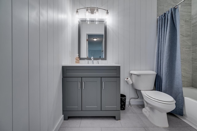 full bathroom with vanity, tile patterned floors, shower / bath combination with curtain, and toilet