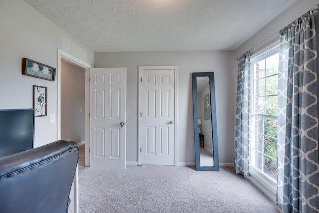 interior space with a textured ceiling