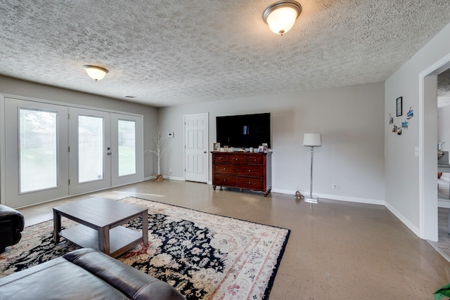 living room with a textured ceiling