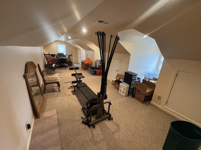 workout area with light colored carpet and lofted ceiling