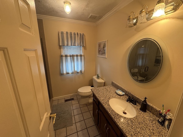 bathroom featuring tile patterned flooring, vanity, ornamental molding, toilet, and a textured ceiling