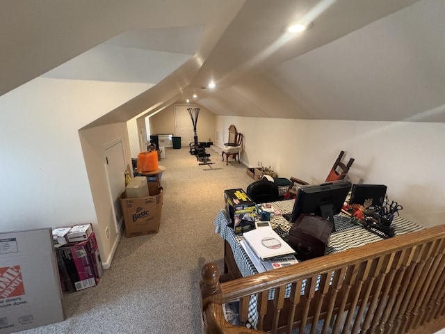 interior space with lofted ceiling and carpet