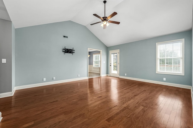 interior space featuring hardwood / wood-style floors, high vaulted ceiling, and ceiling fan