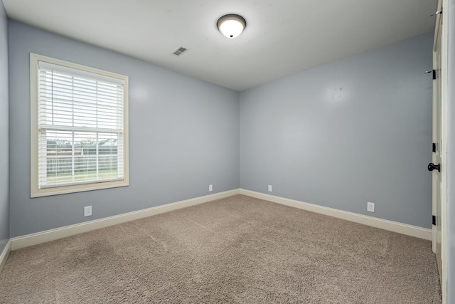 empty room with carpet floors