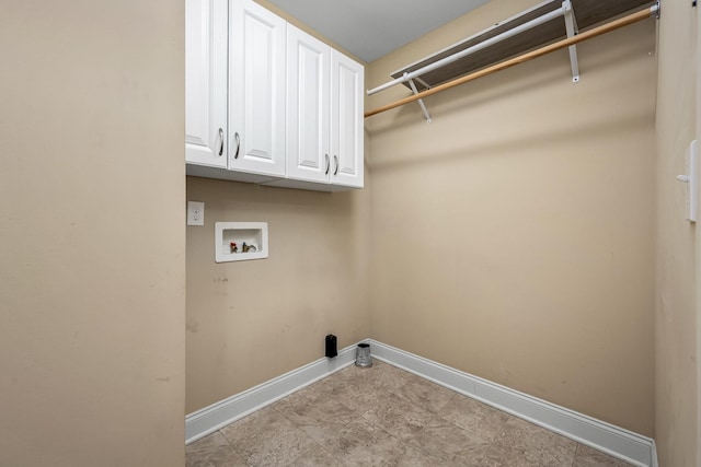 washroom featuring cabinets and washer hookup