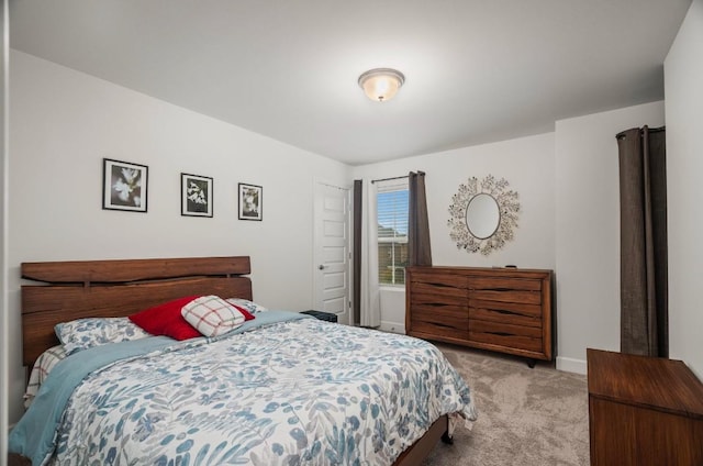 bedroom with light carpet